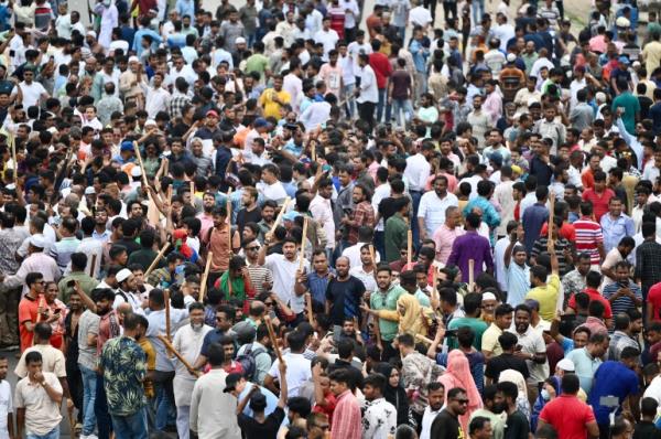 Bangladesh Natio<em></em>nalist party (BNP) activists block a highway entering Bangladesh's capital during a protest demanding the resignation of Prime Minister Sheikh Hasina and a general election under a neutral caretaker government, in Dhaka on July 29, 2023.
